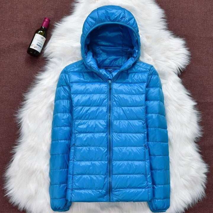 Nord - Neue wasserdichte Jacke mit Füllung aus weissen Entenfedern