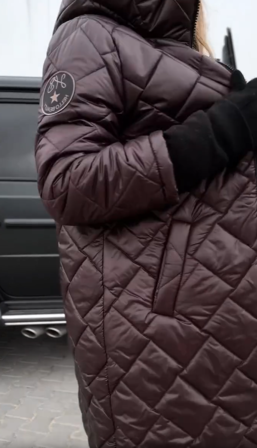 Selina - Elegante gesteppte Daunenjacke mit Kapuze